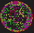 screenshot of a hex game of life that is a complex multi-coloured set of hex agonal tiles in a circular pattern.
